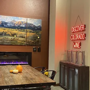 a dining room with a fireplace