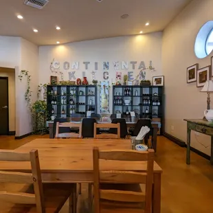 a dining room with a table and chairs