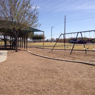 For the big kids...another swing set (4 seats) &amp; covered play area