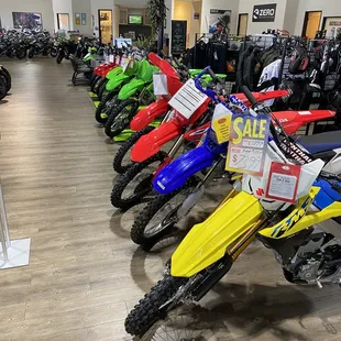 All the colors of the dirt bike rainbow. Red, Blu, Green and Yellow. That's the entire lineup, for Japanese motocross makes.