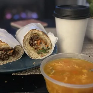 two burritos and a cup of soup