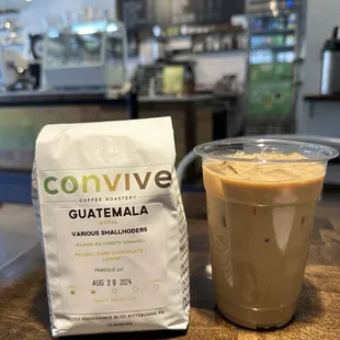 Iced latte and fresh roasted beans.
