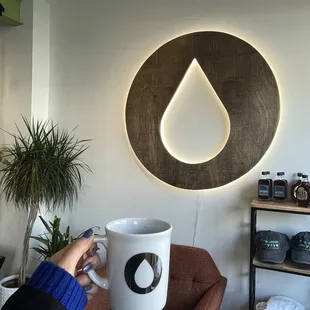 a person holding a coffee mug