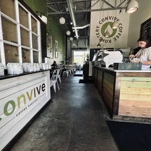 a woman standing at the counter