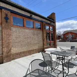 Outdoor seating on west side of business