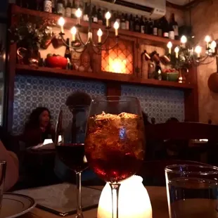 a glass of wine on a table