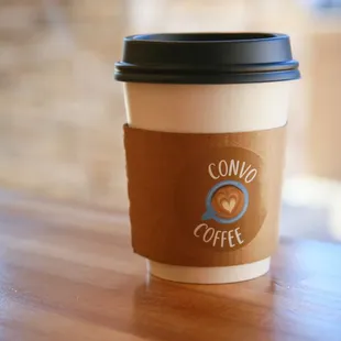 a coffee cup on a table