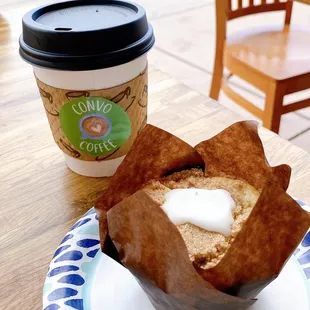 a cup of coffee and a muffin
