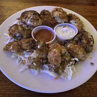 10 pan-fried oysters for $30 with cocktail &amp; tartar sauce on bed of shredded cabbage. 40th Anniversary Oyster run 9/24/23