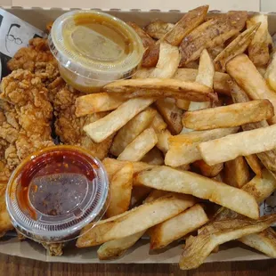 Two jumbo tenders with hand cut fries, honey mustard, and Korean gochujang