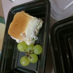 This is Lunch!This is what is supposed to be a chicken sandwich with fruit. It's so disgusting and sad that the kids in Oakland get this.