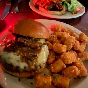 a burger and tater tots