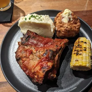 Half Rack of Baby Back Ribs, Mashed Potato, Corn, and Biscuit.
