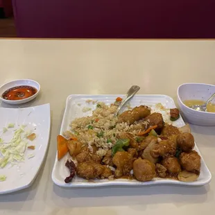 General Tso Chicken with Fried Rice. Spring Roll, Crab Rangoon and Egg Drop Soup.