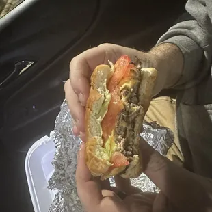 Big double burger with lettuce tomato and cheese
