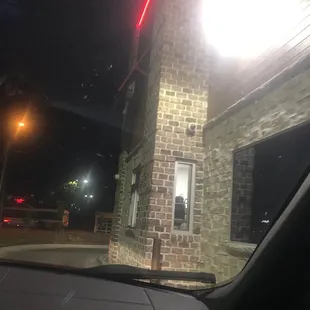 a brick building at night