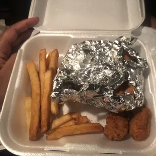 3 nuggets and maybe 11 French fries. This is the only location that seems to do this. I couldn't believe this tray. HORRIBLE