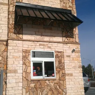 Window for the left lane. The window for the right lane is around the corner.