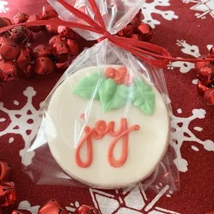  white frosted christmas cookie with red icing