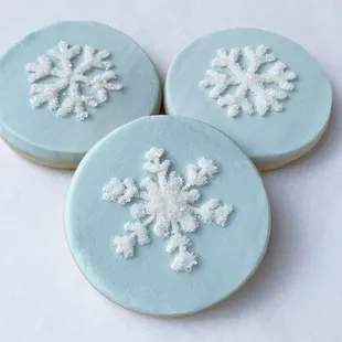 hree snowflake cookies