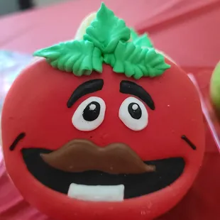 a tomato with a mustache