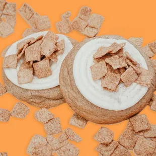 two cookies with frosting