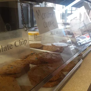 chocolate chip cookies in a display case