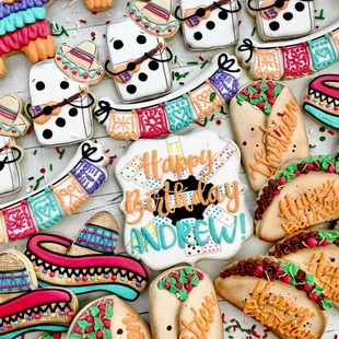 Mexican Themed, mariachi, tacos, burritos, dominoes and pinatas. this large party couldn't have more of my favorites!