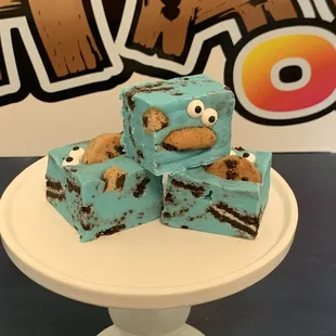 a stack of cookies on a cake plate