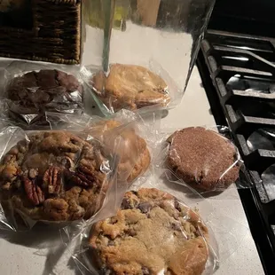 a variety of cookies on a counter