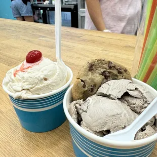 Cow on the left (two scoops) with a cherry. Cookie Sunday Sunday on the right (hold the whip cream and cherry)