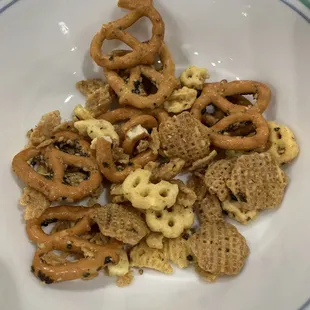 Furikake Party Mix up close, pretzels, honey comb, Chex mix, bugles, all in a nice furikake sweet coating!