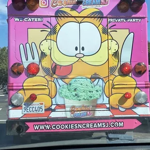 the back of a pink bus