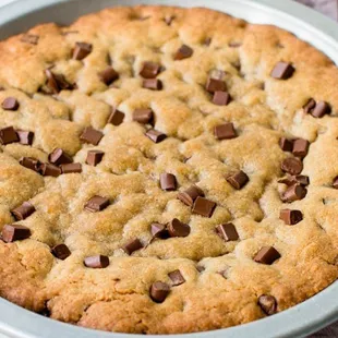 a chocolate chip cookie in a pan