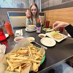  woman eating a meal at a restaurant