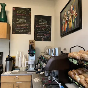 a coffee shop with bread and coffee