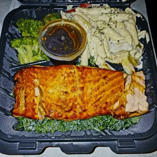 Salmon with jerk pasta and garlic broccoli    Honey garlic sauce