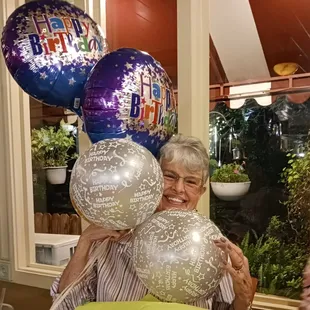 Our birthday girl and note the beautiful surrounding patio landscaping - full of gorgeous happy plants and flowers
