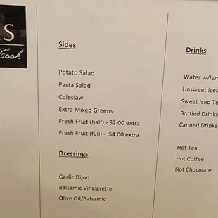 a white refrigerator with a menu on it