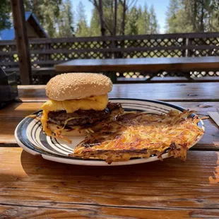 Scrambled egg, cheese, hash brown and a burger. Yum!