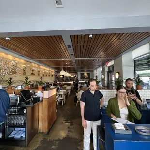 a group of people in a restaurant