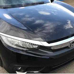 Black Honda after one year of water spot removal
