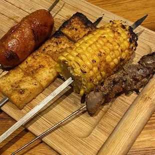 Skewer BBQ Chicken Heart, BBQ corn, BBQ fish cake, and Chinese sausage