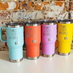 Funky Cold Medina travel mugs.  Enjoy $1 refills on hot or drip coffee, iced tea, lemonade and fountain drinks!