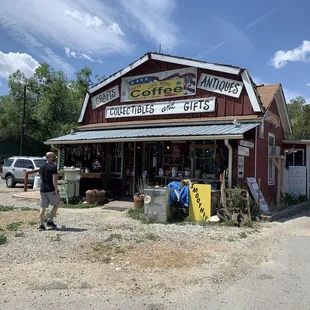 a man standing in front of a store