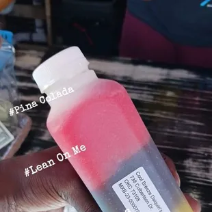 a person holding a bottle of water