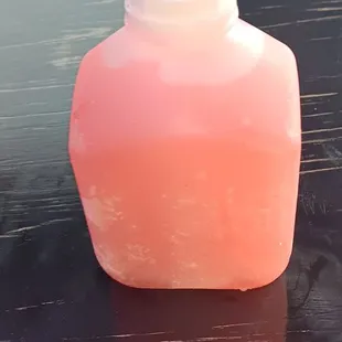 a bottle of water on a table