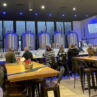 people sitting at the bar