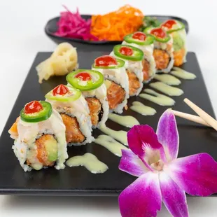 Signature sushi rolls, poke bowls, ramen, and creative spring rolls.