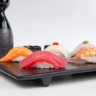 Signature sushi rolls, poke bowls, ramen, and creative spring rolls.